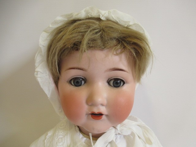 An Armand Marseille bisque socket head doll Image