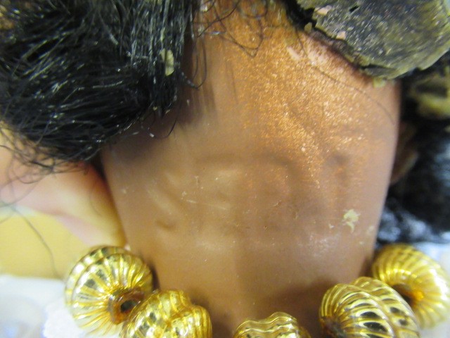 An Armand Marseille bisque shoulder head doll Image