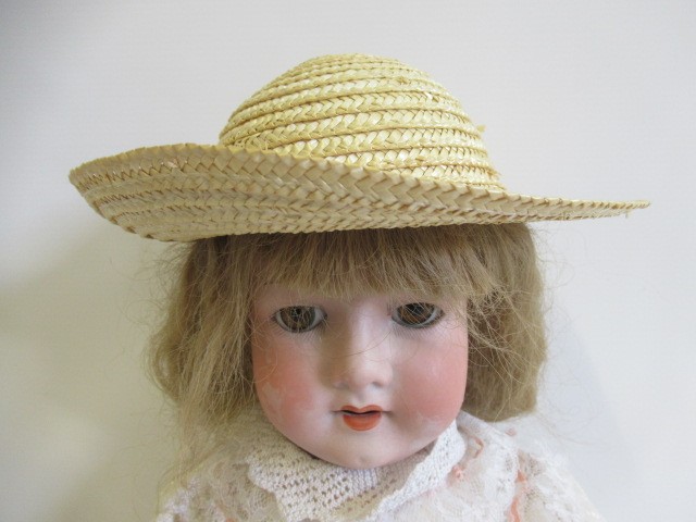 Two German bisque socket head dolls Image