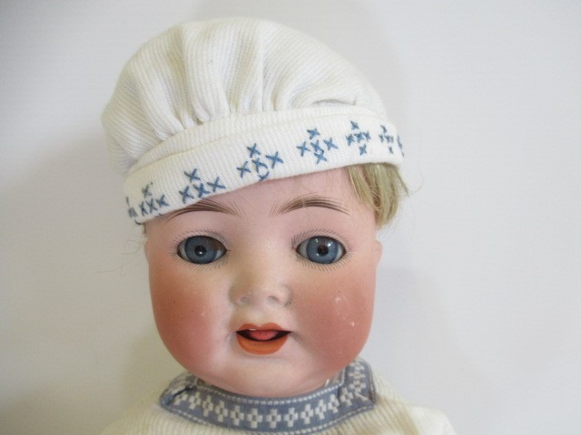 A Heubach Koppelsdorf bisque socket head character doll Image