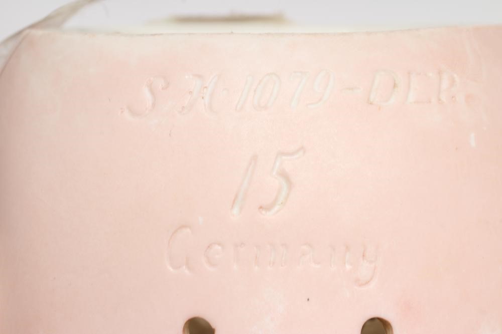 A large Simon & Halbig bisque socket head doll Image