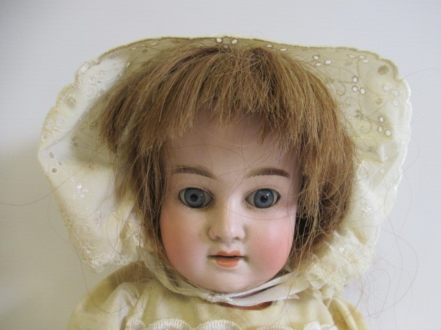 A Schoenau & Hoffmeister bisque socket head doll Image