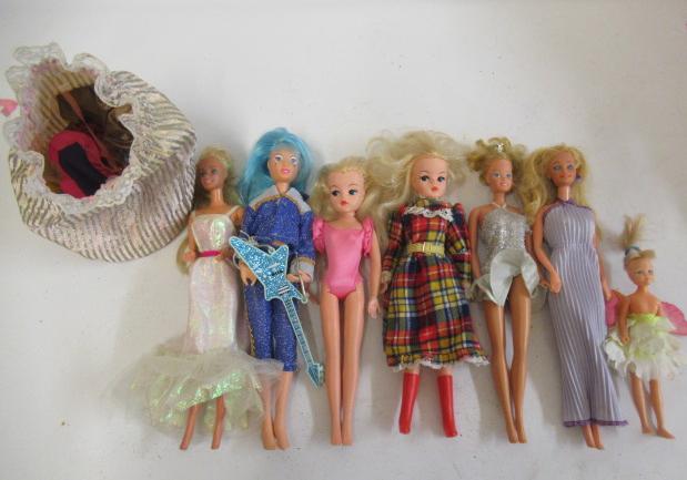 A collection of Barbie and Sindy dolls Image