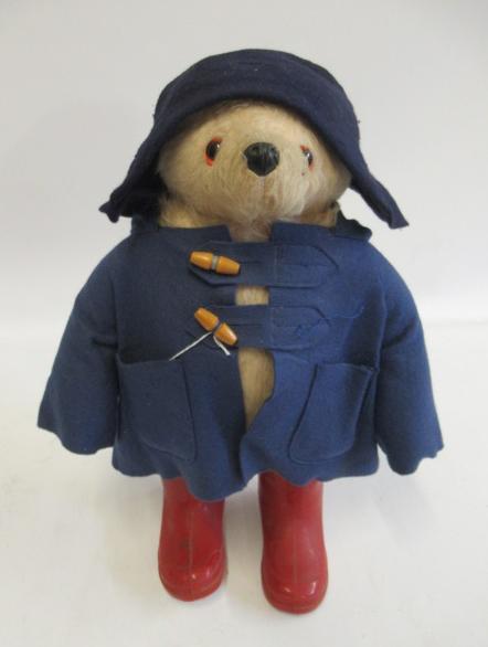 Paddington bear, with blue felt hat, blue coat, label and original red boots. Together with a PB Image