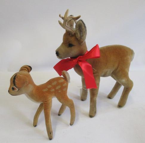 Two 1950s Steiff deer, comprising a Bambi with silver ear button and a Rehbock, largest 35cm (Est. Image