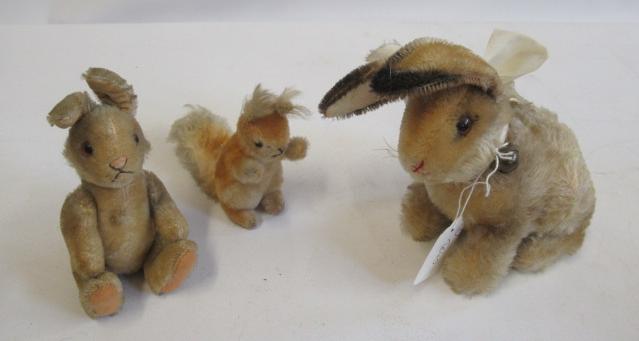 Three Steiff items, comprising a Sonny Hase, a 10cm Possy and a standing rabbit (Est. plus 24% Image