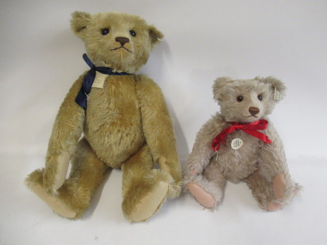 Two Steiff teddy bears, comprising a 22 1/2" 1907 replica bear, with ear button, tag and a card Image