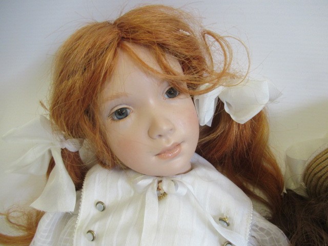 Three collectors dolls Image