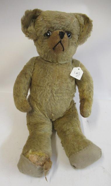 A mid-war English teddy bear, with glass clear eyes, sewn nose, orange plush and cloth paw pads, 19 Image