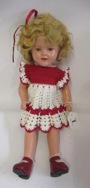 A Shirley Temple doll, with composition socket head, sleeping eyes, open mouth, blond wig, Image