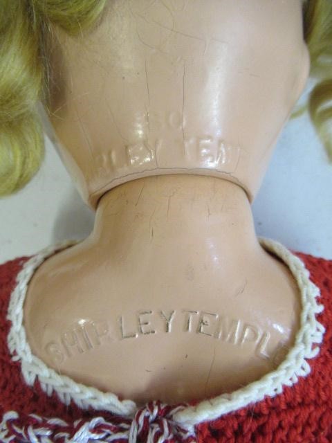 A Shirley Temple doll, with composition socket head, sleeping eyes, open mouth, blond wig, Image