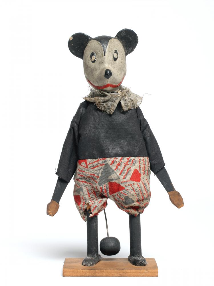 An early Mickey Mouse figure, with composition head, wooden body, original clothing, string tail and Image