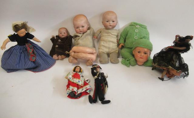 A collection of dolls Image