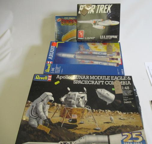 Four Revell and A.M.T. space kits Apollo Moon Lander, Ariane Rocket, Enterprise and Stingray, boxes Image