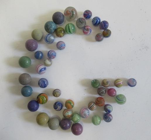 Fifty two early glass and clay marbles from 10-15mm sizes, most items in good condition (Est. plus Image