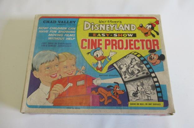 Chad Valley Disneyland Easy-Show Cine Projector with three films, boxed, G-E, and an 8mm film of Image