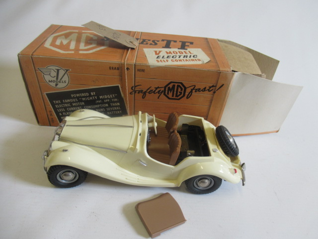 Victory Models battery operated MGTF sports car in white, windscreen missing, battery cover broken, Image