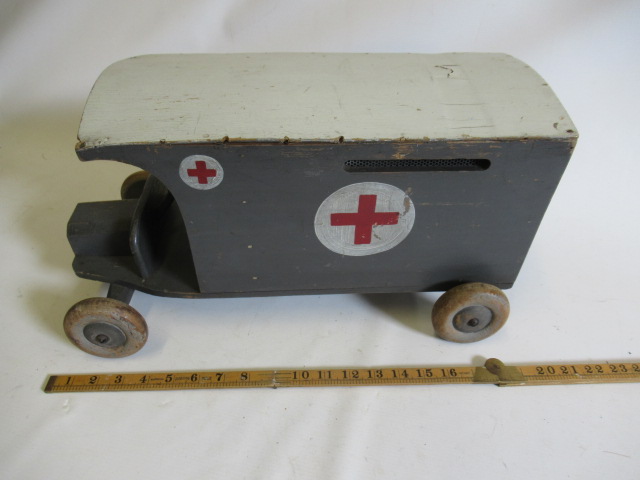 Early 20th century wooden push-a-long ambulance finished in grey/white with opening back doors and Image