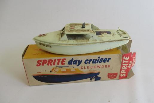 A Sutcliffe Toys Sprite clockwork day cruiser, boxed, F (Est. plus 24% premium inc. VAT) Image