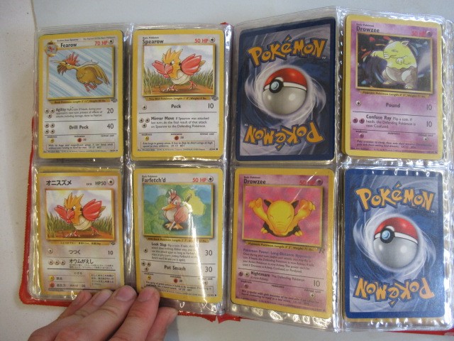 Two Pokemon card collection folders Image