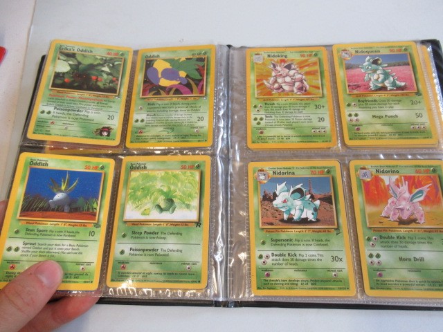 Two Pokemon card collection folders Image
