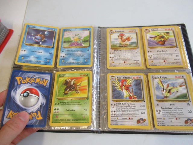 Two Pokemon card collection folders Image