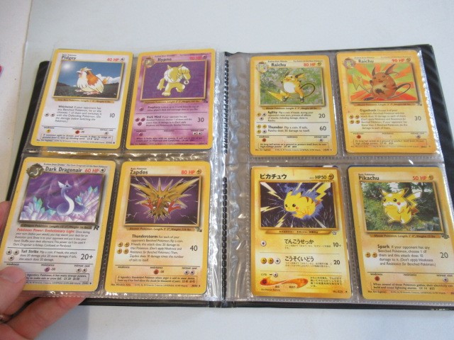 Two Pokemon card collection folders Image