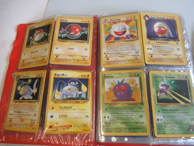 Two Pokemon card collection folders Image
