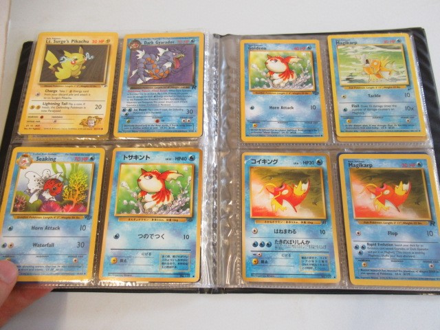 Two Pokemon card collection folders Image