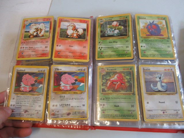 Two Pokemon card collection folders Image