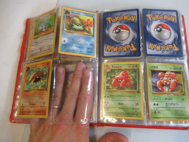 Two Pokemon card collection folders Image