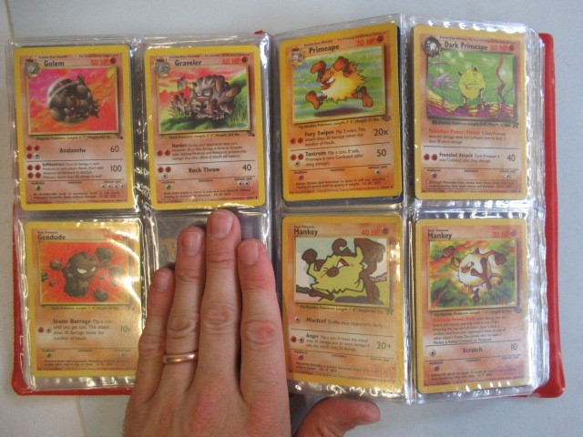 Two Pokemon card collection folders Image