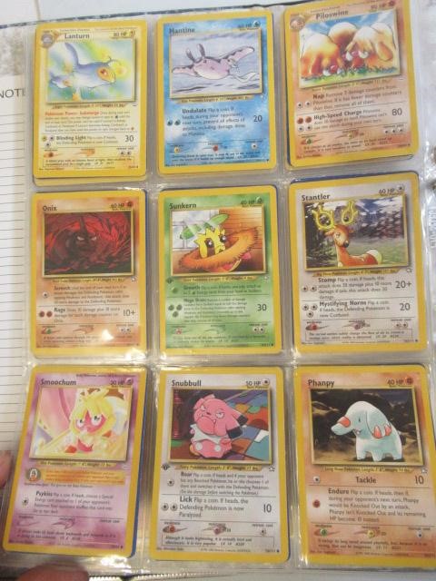 A collection of Pokemon cards, comprising 118 Pokemon and 12 trainer cards. 65 are 1999 Pokemon Image