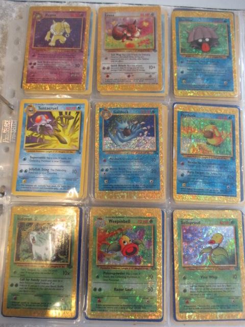 A collection of Pokemon cards, comprising 118 Pokemon and 12 trainer cards. 65 are 1999 Pokemon Image