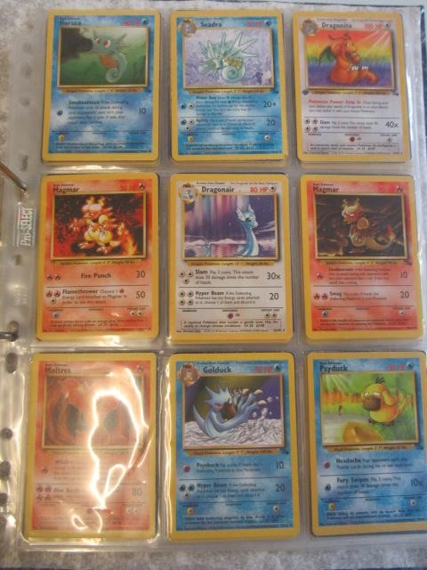 A collection of Pokemon cards, comprising 118 Pokemon and 12 trainer cards. 65 are 1999 Pokemon Image