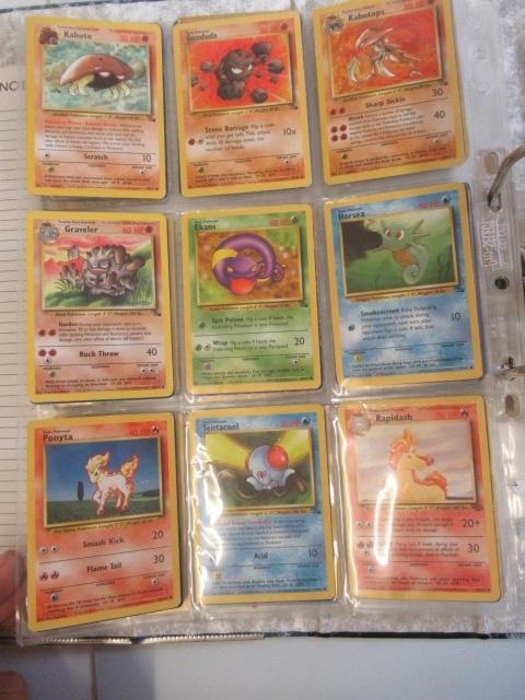 A collection of Pokemon cards, comprising 118 Pokemon and 12 trainer cards. 65 are 1999 Pokemon Image