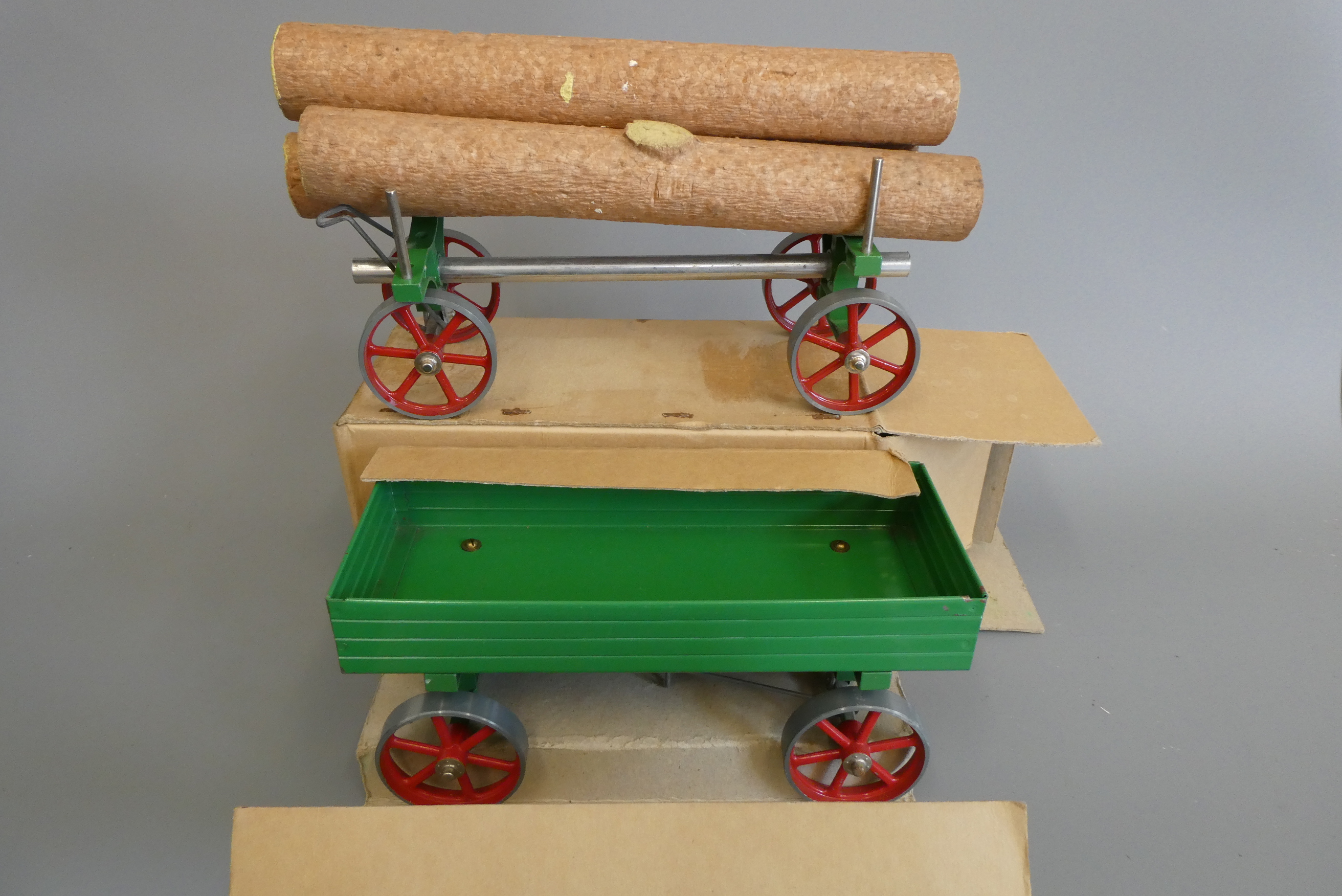 Mamod open wagon, boxed, and log wagon with three logs, G (Est. plus 24% premium inc. VAT) Image