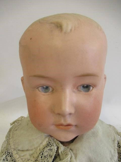 A Heubach solemn boy doll Image