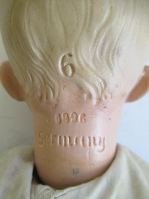 A Heubach solemn boy doll Image