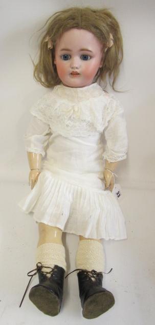 A Simon & Halbig bisque socket head doll Image