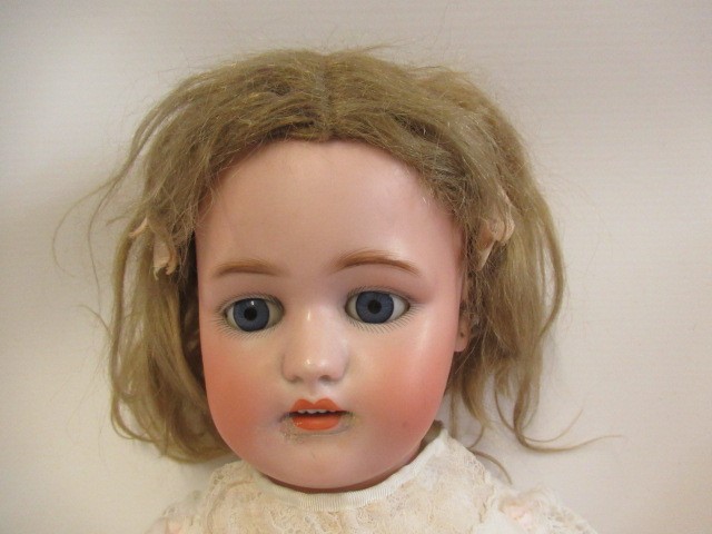 A Simon & Halbig bisque socket head doll Image