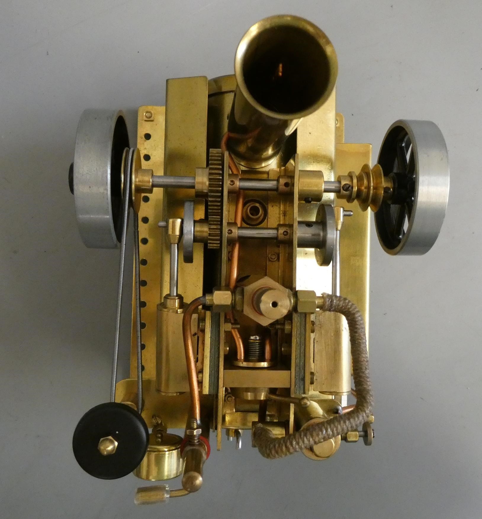 Twin cylinder over-type steam engine, spirit fired boiler with water level plug, pressure gauge, Image