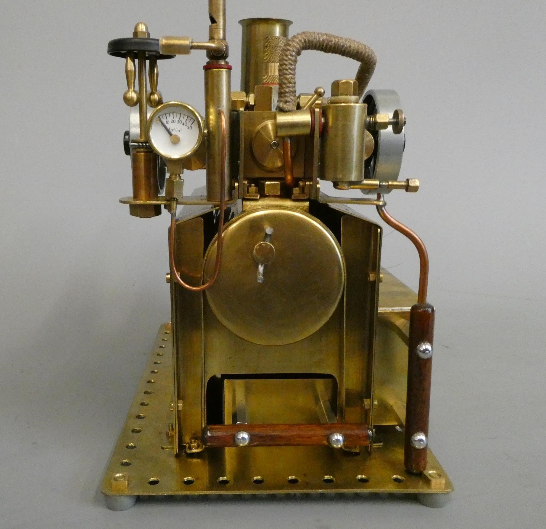 Twin cylinder over-type steam engine, spirit fired boiler with water level plug, pressure gauge, Image