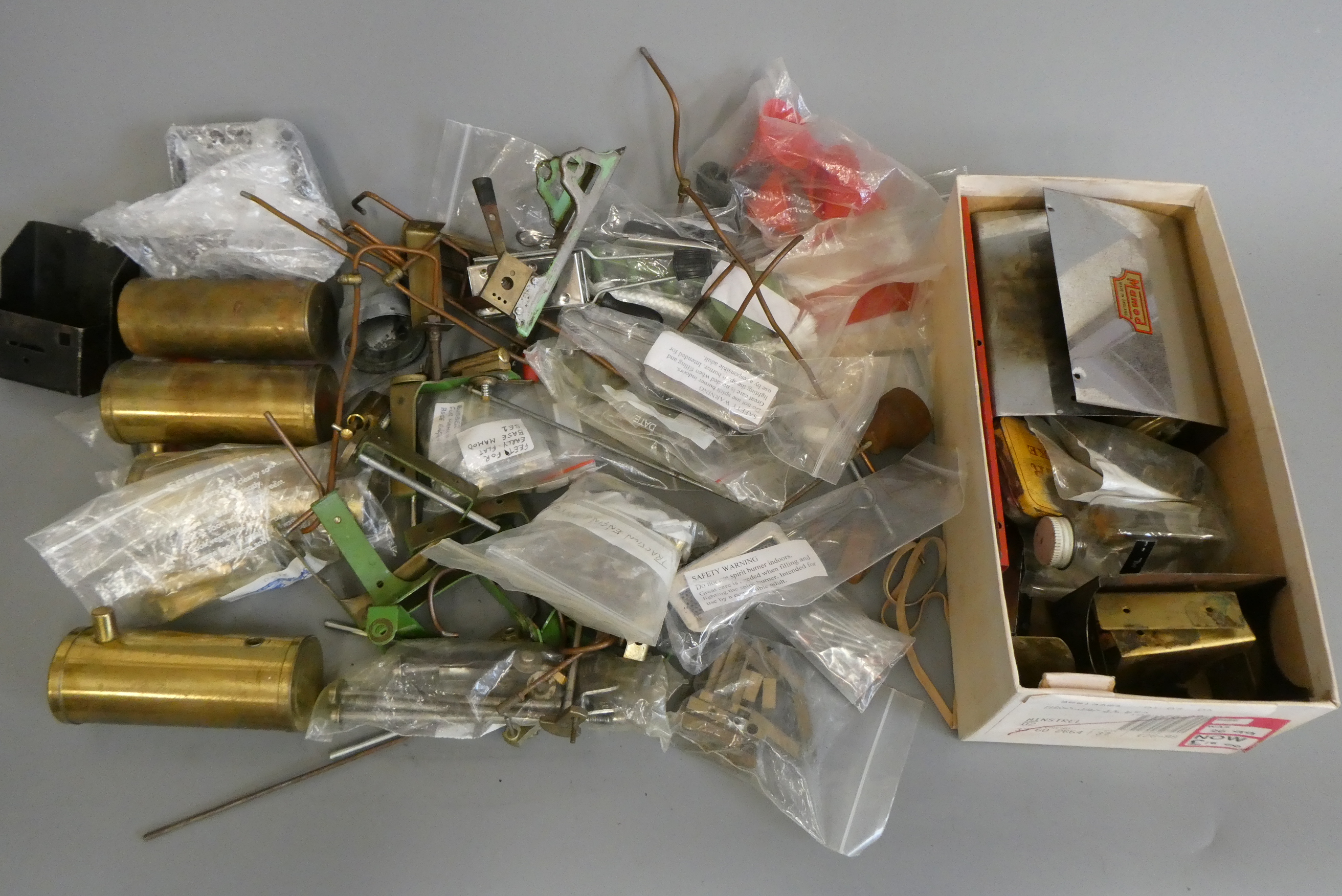 A large quantity of Mamod spare parts including boilers, cylinders, burners and motion parts, some Image