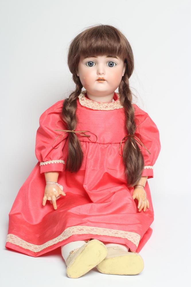 A large German bisque socket head doll Image