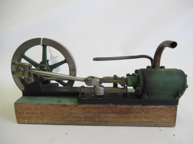 A well made horizontal mill engine, single cylinder, non-reversing, on wooden base, 1 1/4" cylinder Image