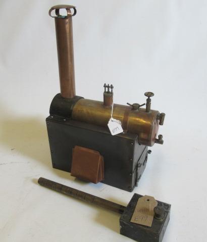 Spirit fired horizontal boiler with water gauge (glass missing) and safety valve, 2 3/4" x 9" (Est. Image