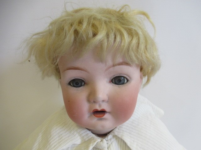 A Gebruder Heubach bisque socket head doll Image