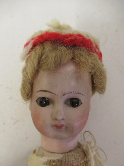 An early bisque head doll Image