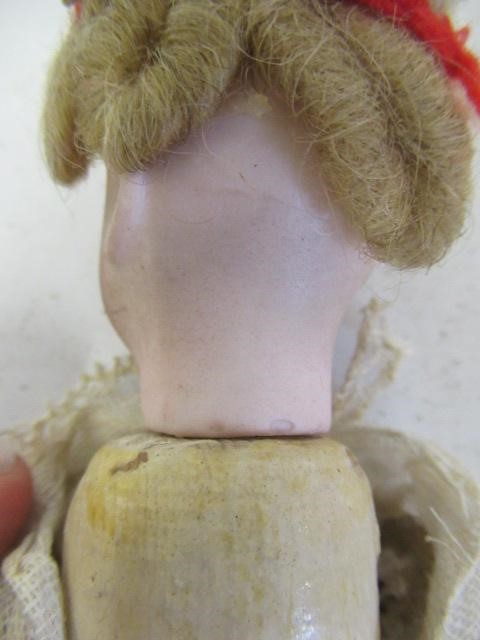 An early bisque head doll Image